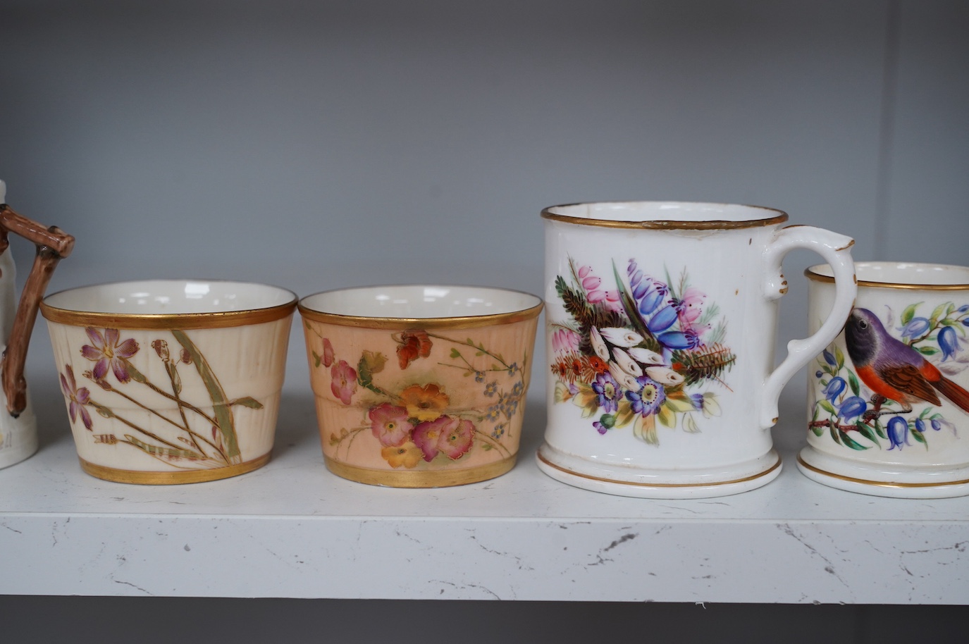 A group of Royal Worcester to include three jugs, two mugs, and two pots, etc. (8). Condition - some damage